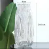 Florero de cristal gris transparente con boca de onda creativa estilo europeo flor de loto bambú rico florero arreglo floral para el hogar