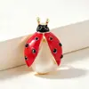 Broche creativo de mariquita de siete puntos, accesorio de insecto de dibujos animados de esmalte de aleación, pin de decoración para mujer moderno y versátil, transfronterizo