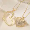 Collar Colgante Corazón Hueco Cortado con Zirconia Chapado en Cobre Oro de 18 Quilates Transfronterizo Europeo y Americano para Mujer, Collar Versátil de Nicho de Gama Alta