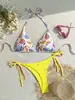 Europeo y Americano Nuevo Cruzado Graffiti de Colores Bikini de Atar al Cuello Bloque de Color Sexy Vacaciones en la Playa Traje de Baño de Dos Piezas Mujer