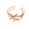 Pulsera abierta de encaje de estrella con goteo de aceite de metal transfronteriza, estilo vintage europeo y americano, joyería de lujo ligero y sensación de alta gama