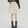 Toma real de falda midi chic de pana vintage estilo coreano, cintura alta, adelgazante, línea A, nueva falda corta otoño/invierno 2026