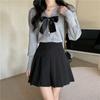 Cárdigan de punto con cuello de lazo para mujer, diseño corto de otoño, nicho, manga larga, camiseta interior, suéter, chaqueta, top