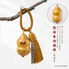 Colgante de animal de dibujos animados lindo tallado en madera maciza natural, accesorio de borla DIY hecho a mano para alivio del estrés y decoración de bolso