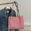 Bolso popular de este año para mujer, nuevo bolso de hombro de gran capacidad de moda 2024, bolso de mano para estudiantes de clase media y alta.