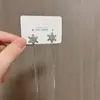 Pendientes de borla con copo de nieve incrustado de diamantes exquisitos franceses estilo elegante de socialité atmósfera un dos en uno sensación de lujo ligero de alta gama pendientes