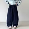 Suéter cárdigan de punto para niña 2026 primavera y otoño nuevo conjunto casual de dos piezas con top a rayas y pantalones holgados