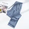 Pantalones Deportivos de Seda Helada Elástica de Verano Caliente Transfronterizos Casuales Combinan con Todo Sueltos Sueltos Estampado Fijo de Logo para Parejas