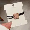 Corda de Cabelo de Borracha com Cabeça de Trevo de Quatro Folhas para Mulheres Corda de Cabelo Outono e Inverno Simples Ins Elegante