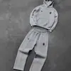 Sudadera con capucha casual simple para pareja de moda transfronteriza europea y americana, bordado de logotipo de cinco estrellas con pantalones deportivos