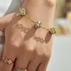 Set de joyería de acero inoxidable estilo lujo transfronterizo europeo y americano con circonita cúbica de colores en forma de esfera, incluyendo un brazalete, un collar y unos pendientes