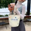 Venta al por mayor del fabricante Bolso de mano artístico de moda Bolso de lona Bolso tipo cubo de gran capacidad para mujer 2026 Nuevo Bolso para almuerzo de trabajo