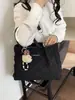 Bolso de mano simple para mujer 2026 nuevo modelo, lindo bolso tote para mujer, bolso de hombro para commuting de nicho de gran capacidad, bolso de mano versátil