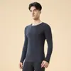 Nuevo conjunto térmico de camelia para otoño e invierno, alta elasticidad y comodidad, conjunto de capa base para calor y protección contra el frío, venta al por mayor de tops y pantalones de otoño