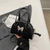 Bolso de diseño de nicho para mujer, novedad de verano 2024, estilo coreano, estilo bolos, bandolera de hombro con diseño de macarrón a juego.
