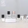 En Stock Botella de Perfume de 15 ml con Forma de Estrella Mini Botella con Atomizador Portátil Botella Cosmética Recargable Botella con Tapa de Rosca y Atomizador de Presión
