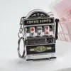 Mini Máquina de Frutas Llavero Colgante Juego de Darle Vueltas Máquina de Tigre LaBa Joyería Pequeña Sorteo Colgantes Decorativos