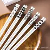 Palillos de cerámica estilo Hepburn para el hogar, 5 pares, resistentes a altas temperaturas, fáciles de limpiar, a prueba de moho, simples, blanco y negro, un par de palillos al por mayor