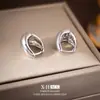 Pendientes Geométricos Plateados Brillantes con Forma de Gota Moda Europea y Americana Pendientes de Diseño Curvo de Nicho Pendientes Únicos Personalizados