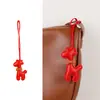 Bolsa de jirafa de moda de alta gama, estilo nuevo, versátil, linda, colgante, borla de bufanda de seda, accesorio de regalo pequeño, transfronterizo