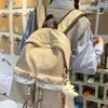 Mochila Xadrez Estilo Hong Kong Retrô para Mulheres 2025 Nova Mochila Escolar de Grande Capacidade para Alunos do Ensino Fundamental e Universitários Mochila de Viagem para Computador