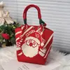 2026 Nova Bolsa de Presente de Natal Tricotada Transfronteiriça com Padrão de Boneco de Neve Vermelho e Verde, Bolsa Pequena de Balde com Cordão Manual, Bolsa de Presente