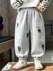 Ropa infantil pantalones para niños primavera y otoño 2026 nuevo estilo pantalones deportivos para niños pantalones de chándal casuales para niños pantalones largos para niños