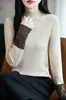 Apoiamos a venda por atacado de suéteres de tricô bege, confortáveis, de caimento solto, em estilo relaxado, perfeitos para usar em camadas no outono e inverno, com um design retrô de gola alta meia para mulheres.