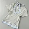 Camiseta de Manga Corta Estilo Coreano Chica Picante con Cuello Halter, Falso Dos Piezas para Mujer, Nuevo Modelo de Verano, Diseño Único, Corte Ajustado, Ceñida a la Cintura, Top Favorecedor