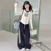 Conjunto de Dos Piezas para Niñas Primavera y Otoño 2026 Nuevo Otoño Camiseta Rayada para Niñas Pantalones Largos Casuales Pantalones de Pierna Ancha para Niños Modernos