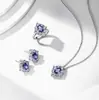 Star Language Mismo Estilo Alta Imitación Zafiro Tan Diamante Destellante Pendientes para Mujer de Gama Alta Lujo Ligero Pendientes Elegantes Anillo de Moda