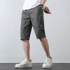 Pantalones cortos de algodón para hombre de mediana edad, pantalones cortos de algodón de papá, pantalones casuales finos de verano, pantalones de playa holgados de talla grande, pantalones de longitud media