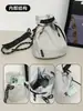 Bolso pequeño cruzado de nailon estilo japonés color liso vertical para teléfono monedero casual minimalista bolsa para auriculares bolsa de tela cruzada ins