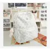 Mochila Escolar Estilo Graffiti 2026 Nova Versão Coreana Mochila Versátil Casual Grande Capacidade para Alunos do Ensino Fundamental II e Médio