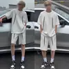 Conjunto de moda de verano nuevo y moderno con diseño de remaches, versátil, holgado, transpirable, conjunto casual de dos piezas de manga corta y shorts