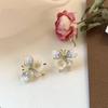 Pendientes de plata con forma de mariposa y flor de perla retro francesa, pequeños y exquisitos, de alta gama, con diseño de hada súper dulce para mujer.