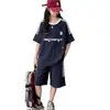Conjunto de Verano para Niñas 2026 Nuevo Estilo Camiseta Rayada de Manga Corta Casual y Pantalones Cortos Ligeros Conjunto de Dos Piezas para Niños Mayores