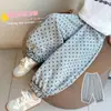Pantalones de chándal para niña 2026 Nuevo estilo coreano Moda Pantalones casuales para niñas pequeñas con elegantes puños fruncidos y lunares