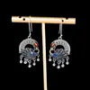 Carácter plata s925 plata moda retro azul quemado pavo real filigrana borla pendiente simple damas nicho pendientes