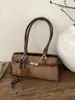 Bolsa de Ombro Retro de Alta Qualidade para Commuter Feminino 2025 Nova Bolsa Simples de Camurça Bolsa Platina