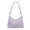 La popular bolsa de mano para dumplings de estilo fresco de este año para mujer, nuevo modelo de otoño 2026, elegante bolso de hombro con lazo, bolso de moda para el antebrazo