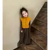 Conjunto de niña 2026 nuevo primavera y otoño estilo coreano chaleco suéter camisa base de manga larga pantalones anchos casuales conjunto de tres piezas