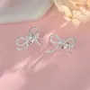 Brinco de Clipe para Orelha Zircônia Laço Torcido Outono e Inverno Novo Milênio Garota Popular Estilo Celebriade da Internet Corda Torcida Sem Furo Clipe de Osso da Orelha