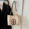 Bolso de hombro y axila muy estiloso, nuevo para el otoño de 2025, versátil, tendencia en Instagram, bolso elegante para la oficina, bolso tote