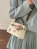 Bolso de mujer de alta gama de nicho, nuevo modelo verano 2026, bolso de hombro y cruzado súper popular, bolso de mano superventas para chicas, bolso Kelly