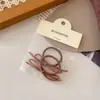 Lazo Delgado Simple para el Cabello Paquete de 2 Gomas de Pelo con Lazo Juveniles Goma Básica para Cola de Caballo Goma para el Cabello de Mujer