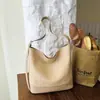 Bolsa de palha para mulheres, bolsa bucket moderna, nova bolsa de ombro de nicho da moda 2026, bolsa pequena de ombro único transversal com textura vintage