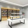 Expositor, estante para exhibición de cosméticos, vitrina central, vitrina para joyería, estante de supermercado de tres niveles, estante de exhibición promocional