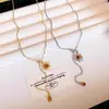 Collar de Girasol de Lujo Ligero para Mujer 2024 Nuevo Accesorios de Nicho de Lujo Ligero Cadena para Suéter Popular Otoño e Invierno