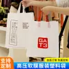 Bolsas de mano de alta y baja presión, bolsas de embalaje, bolsas de regalo, bolsas para ropa, bolsas con asa de corte para cuatro dedos, personalizables con impresión de logo